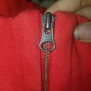 Red turtle neck with rainbow chest